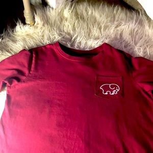 A  long sleeved ivory Ella maroon shirt